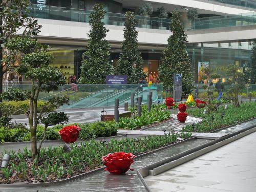 Landscaped underground parking deck with water features